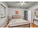 Comfortable bedroom featuring a ceiling fan and stylish decor at 90 Spring St # Ab, Charleston, SC 29403