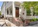 Charming home exterior featuring a brick entryway and lush landscaping at 90 Spring St # Ab, Charleston, SC 29403