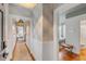 Bright hallway with patterned wallpaper leading to multiple rooms at 90 Spring St # Ab, Charleston, SC 29403