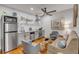 A compact living area with stainless steel appliances, sleek cabinetry, and inviting decor at 90 Spring St # Ab, Charleston, SC 29403