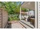 Charming patio area with outdoor seating, plants, and a privacy fence at 90 Spring St # Ab, Charleston, SC 29403