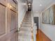 Entryway featuring a carpeted staircase and stylish interior design at 90 Spring St # Ab, Charleston, SC 29403