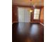 A lovely dining area with hardwood floors and bright natural light near a doorwall at 9028 Maple Grove Dr, Summerville, SC 29485