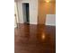Hallway with hardwood floors with view into bathroom at 9028 Maple Grove Dr, Summerville, SC 29485