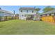 The spacious backyard features a well-manicured lawn and backyard outdoor amenities at 928 Ashley Ave, Charleston, SC 29403
