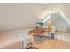 Bright bedroom features a skylight, desk, and decorative rug at 928 Ashley Ave, Charleston, SC 29403