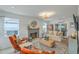 Cozy living room featuring a decorative fireplace, comfortable seating, and hardwood floors at 928 Ashley Ave, Charleston, SC 29403