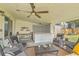 Charming patio area with bar, seating, and ceiling fan at 928 Ashley Ave, Charleston, SC 29403