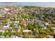 Picturesque aerial view of the neighborhood showcasing its verdant trees, charming homes, and waterway views at 10 Logan St # 6, Charleston, SC 29401