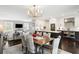 Open-concept dining area seamlessly connected to the living room and kitchen, ideal for entertaining guests at 10 Logan St # 6, Charleston, SC 29401