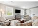 Comfortable living area with modern decor, ample natural light, and a relaxing atmosphere at 10 Logan St # 6, Charleston, SC 29401