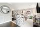 Bright living room featuring stylish furniture, decor, and ample space for relaxation and entertaining at 10 Logan St # 6, Charleston, SC 29401