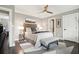 A well-lit primary bedroom features stylish furniture and decor at 10 Logan St # 6, Charleston, SC 29401