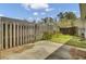 Backyard featuring a wooden fence and a cement patio at 100 Bridgetown Rd # 10B, Goose Creek, SC 29445