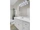 Bathroom featuring a sink with white vanity, toilet, and a shower at 100 Bridgetown Rd # 10B, Goose Creek, SC 29445