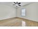 Bright bedroom features a ceiling fan and hardwood floors at 100 Bridgetown Rd # 10B, Goose Creek, SC 29445