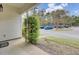 Covered front porch with landscaping showcasing the home's entry and nearby parking at 100 Bridgetown Rd # 10B, Goose Creek, SC 29445
