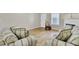 Spacious living room with hardwood floors, fireplace, and comfortable seating arrangement at 100 Bridgetown Rd # 10B, Goose Creek, SC 29445
