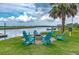 Outdoor firepit with Adirondack chairs providing riverfront relaxation at 102 Tidewater Way, Charleston, SC 29492