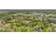 Panoramic aerial view showcasing a community surrounded by lush trees, nearby shopping, and local landmarks at 1034 Orangeburg Rd, Summerville, SC 29483