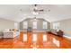 Large bonus room showcasing hardwood floors, high ceilings, recessed lighting, ceiling fans, and ample natural light at 1034 Orangeburg Rd, Summerville, SC 29483