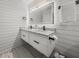 Stylish bathroom vanity with double sinks, granite countertop, and modern black faucets at 107 Woodland Dr, Summerville, SC 29485