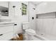 Elegant bathroom with a modern vanity, toilet, and a shower featuring white marble tile at 107 Woodland Dr, Summerville, SC 29485