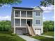 Two-story home featuring a double porch, siding, and garages on the ground level at 108 Tidewater Way, Charleston, SC 29492