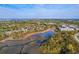 Breathtaking aerial view of a coastal residential area with scenic waterways and lush greenery at 1115 Barfield St, Charleston, SC 29492