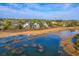 Scenic community of homes along a tranquil waterfront, showcasing beautiful residences and natural surroundings at 1115 Barfield St, Charleston, SC 29492