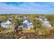 Aerial view showing waterfront backyard and fenced-in lawn area at 1115 Barfield St, Charleston, SC 29492