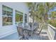 Outdoor dining set on the back deck is ideal for enjoying meals al fresco at 1115 Barfield St, Charleston, SC 29492