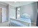 Cozy bedroom featuring neutral walls, a large closet, and a window with natural light at 1115 Barfield St, Charleston, SC 29492