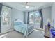 Bright bedroom featuring neutral walls, carpet, and a window with natural light at 1115 Barfield St, Charleston, SC 29492