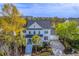 Charming two-story home with a welcoming front porch and professionally landscaped front yard at 1115 Barfield St, Charleston, SC 29492