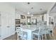 Beautiful kitchen with a large center island, white cabinetry, and stainless steel appliances at 1115 Barfield St, Charleston, SC 29492