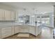 Bright and airy kitchen featuring white cabinets, granite counters, and lots of natural light at 1115 Barfield St, Charleston, SC 29492