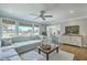 Comfortable living area with a large sectional sofa and natural lighting at 1115 Barfield St, Charleston, SC 29492