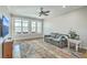 Cozy living room with a comfortable couch, a ceiling fan, and lots of natural light at 1115 Barfield St, Charleston, SC 29492