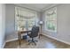 Bright office with hardwood floors, gray walls, and dual windows with view of outdoors at 1115 Barfield St, Charleston, SC 29492