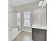 Bright bathroom featuring a glass-enclosed shower and modern vanity at 112 Tin Can Aly, Summerville, SC 29483