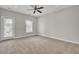 Spacious bedroom with ceiling fan, lots of natural light, and access to the backyard at 112 Tin Can Aly, Summerville, SC 29483
