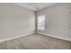 Well-lit bedroom with a window, ceiling fan, and plush carpeting at 112 Tin Can Aly, Summerville, SC 29483
