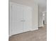 Hallway with double doors leading to a carpeted closet at 112 Tin Can Aly, Summerville, SC 29483