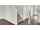 Hallway with wood flooring and staircase at 112 Tin Can Aly, Summerville, SC 29483