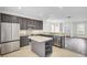 Bright kitchen with stainless steel appliances, center island, and tiled floors at 112 Tin Can Aly, Summerville, SC 29483