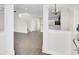 Open-concept living room with hardwood floors and staircase access at 112 Tin Can Aly, Summerville, SC 29483