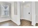 Bright living room featuring wood floors, white trim and ample natural light at 112 Tin Can Aly, Summerville, SC 29483