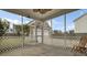 A screened porch view with concrete flooring, a ceiling fan, and white lattice at 112 Tin Can Aly, Summerville, SC 29483