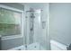 Bathroom with a glass-enclosed shower featuring dual shower heads at 1121 Inverness Ln, Hanahan, SC 29410